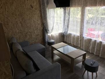 Фото номера Шале с одной спальней Комплексы для отдыха с коттеджами/бунгало Borowiak г. Szteklin 6